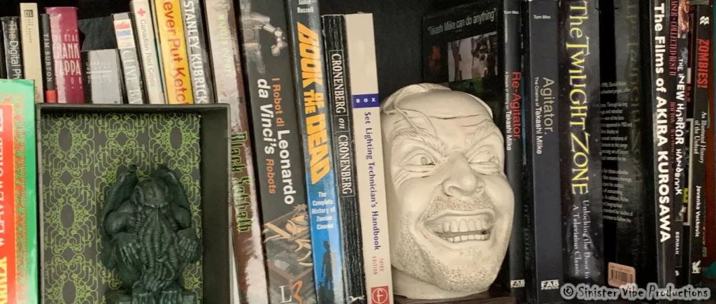 Jack Torrence on a book shelf