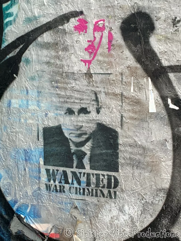 Wanted Putin war criminal graffitti