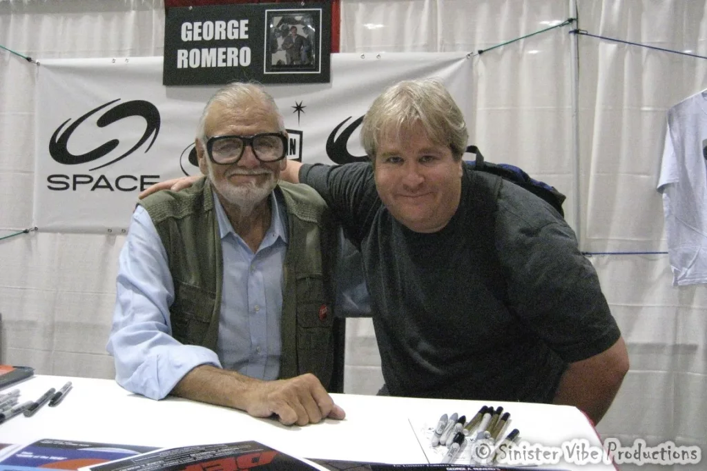 Photo of Smite and George Romero.