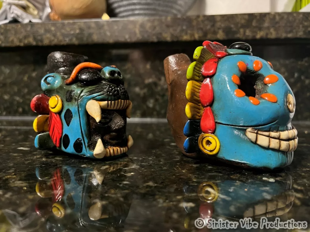 Side photo of screaming Aztec death and jaguar whistle