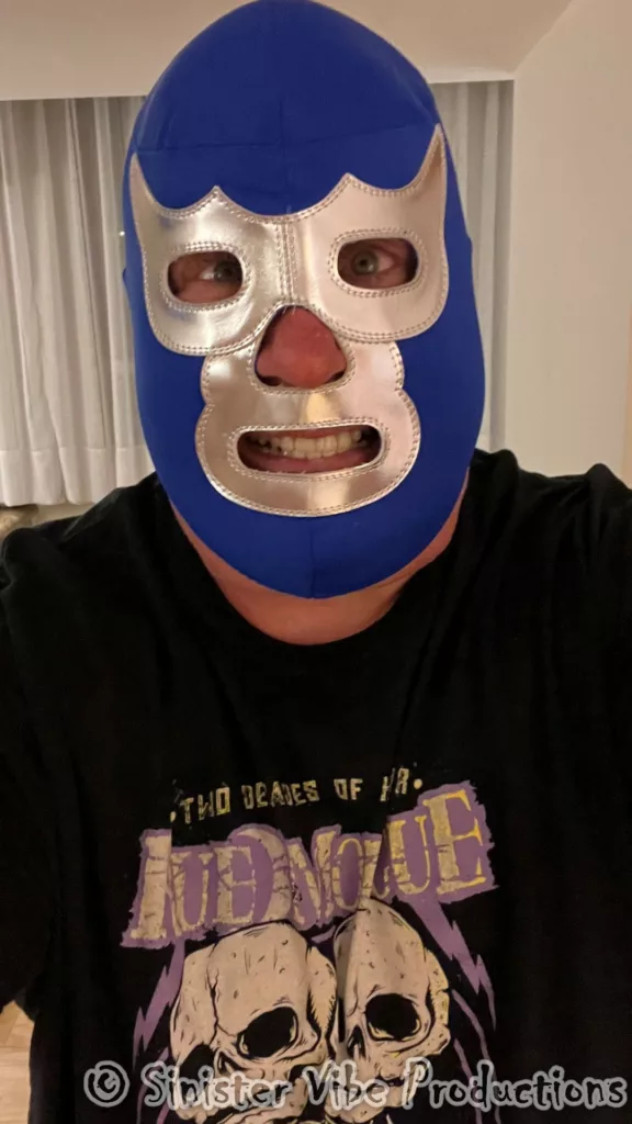 Smite wearing Blue Demon mask