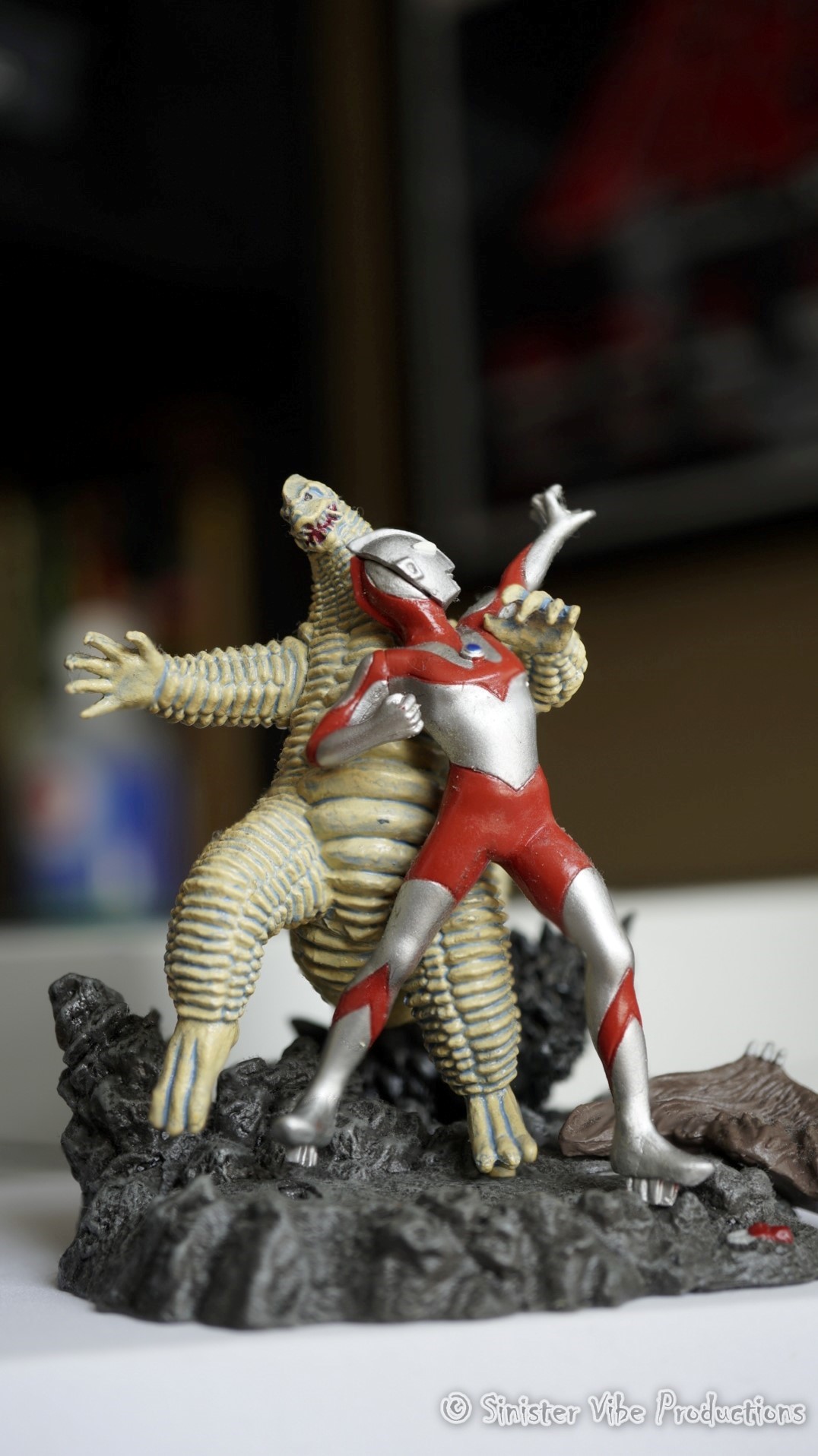 Photo of model Ultraman fighting a monster. Use of focus staking method