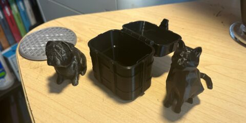 photo of 3d prints of a dog, a box and a cat