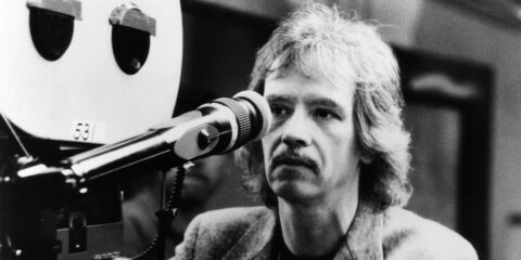 Photo of Director John Carpenter with a camera