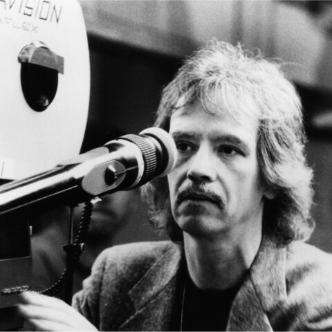 Photo of Director John Carpenter with a camera