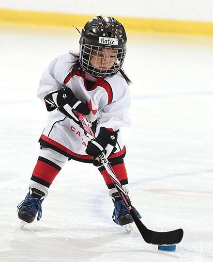Timbit hockey player skating