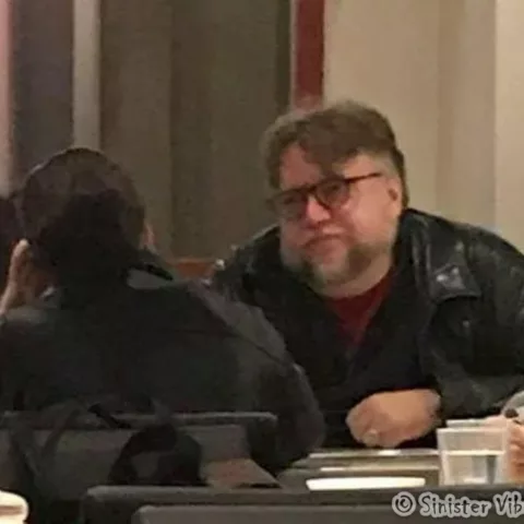 Photo of Guillermo Del Toro eating lunch