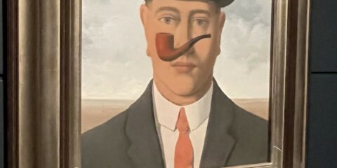 Photo of painting of man win bowler hat and pipe