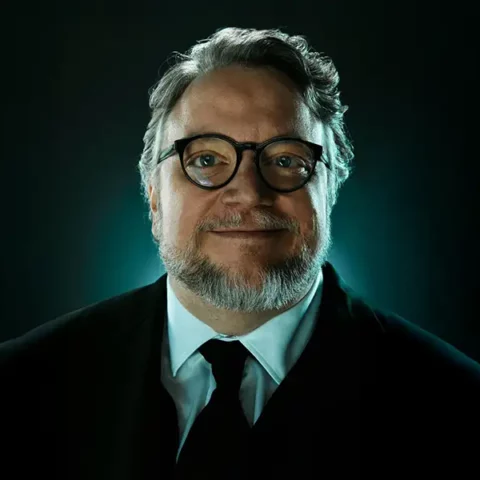 Photo of Guillermo del Toro in a suit