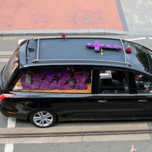 Photo of hearse containing Ozzy Osbourne's coffin
