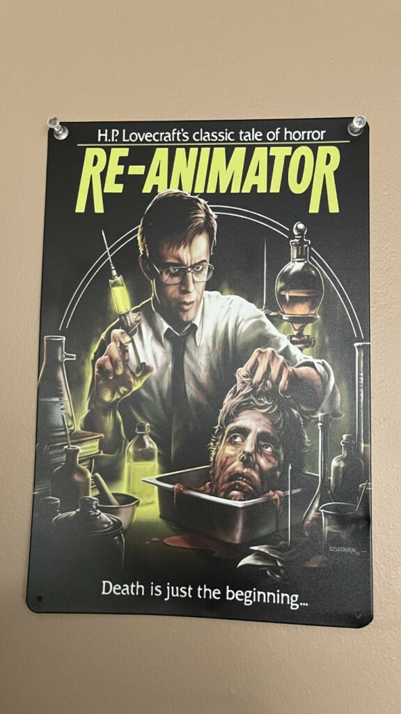 Photo of metal film poster of Re-Animator