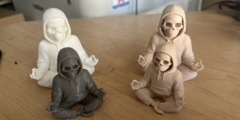 photo of a group of skeletons in hoodie