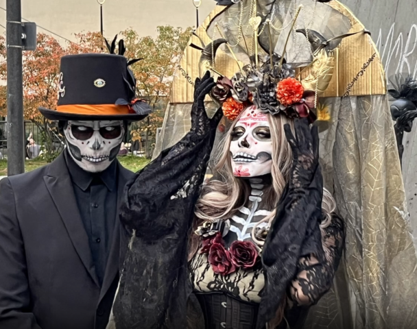photo of two dia de los muertos characters