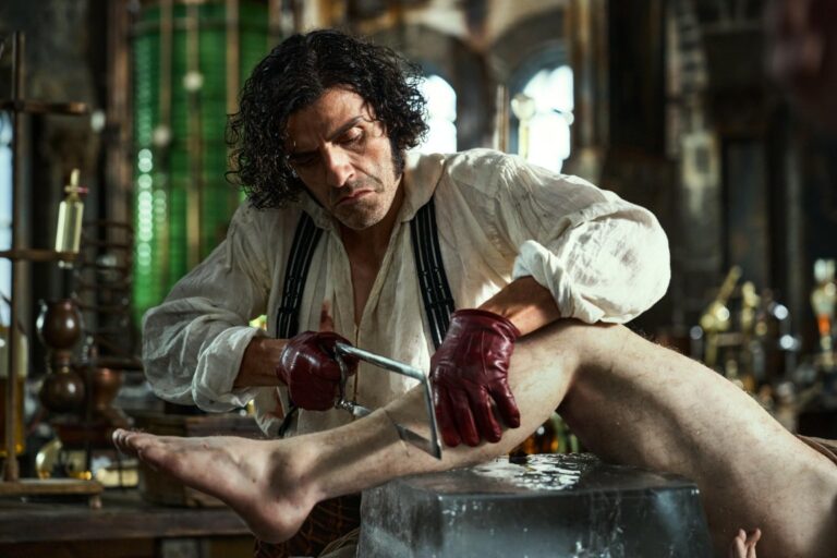 Photo of Dr. Frankenstein cutting a a cadaver lag
