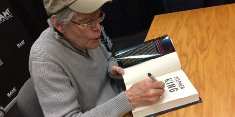 Photo of Stephen King signing on of this books
