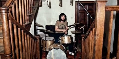 Photo of John Bonham drumming