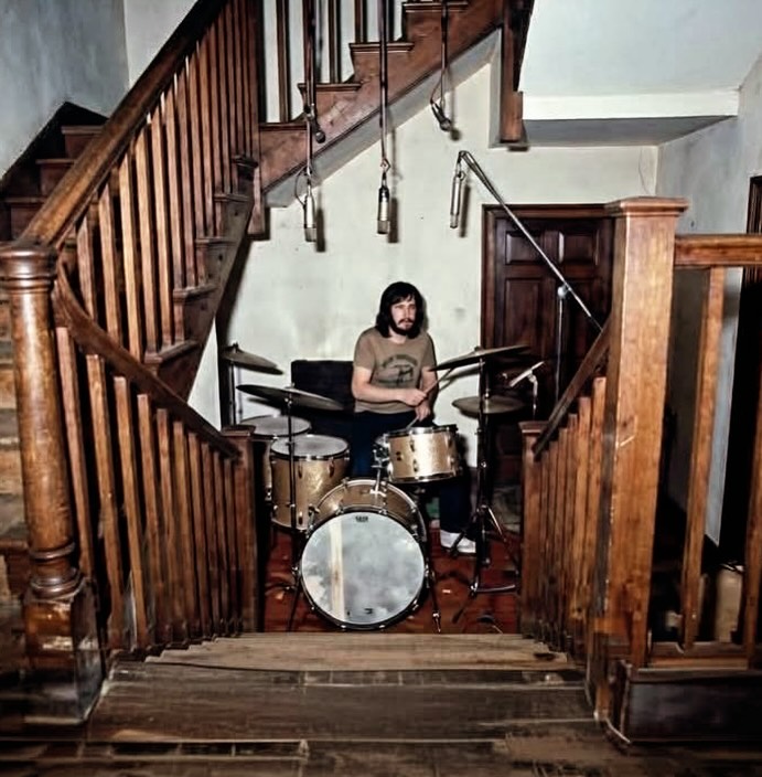 Photo of John Bonham drumming